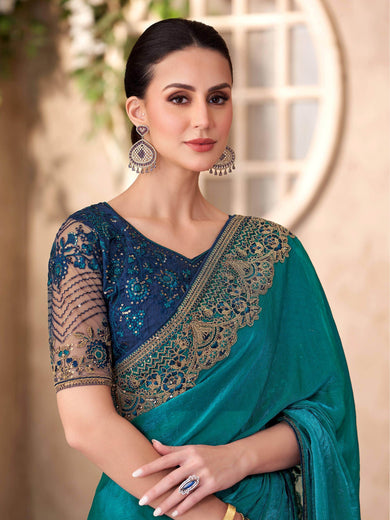 Mesmerizing Teal Blue Georgette Border Work Festival Wear Saree